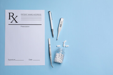 Medical prescription form, tweezers, pills and thermometer on light blue background, flat lay....