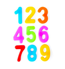 Colorful numbers on white background, top view