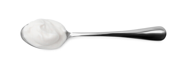 Delicious natural yogurt in spoon isolated on white, top view