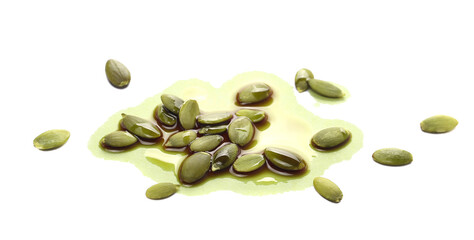 Pumpkin oil puddle, spilled and pile seeds isolated on white, side view 