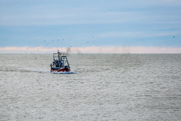 Obraz premium A fishing vessel sailing in the Atlantic Ocean near Mar del Plata, Argentina