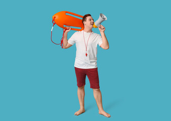 Male lifeguard with rescue tube buoy and megaphone on blue background