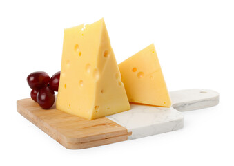 Pieces of delicious cheese and grapes isolated on white