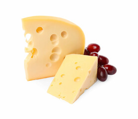Pieces of delicious cheese and grapes isolated on white
