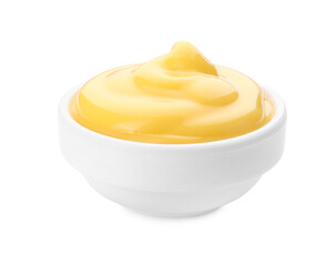 Delicious cheese sauce in bowl isolated on white