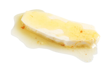 Piece of melting butter on white background