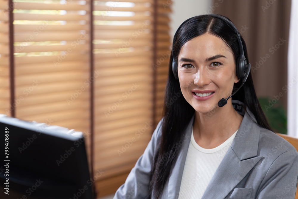 Aufkleber female call center operator or customer service helpdesk staff working on workspace while talking on