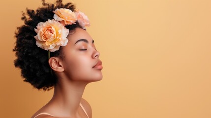 Young sensual african americal girl with flowers in her hair, copy space