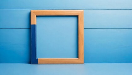 Photo frame made of wood with a blue background and copy space created with generative ai