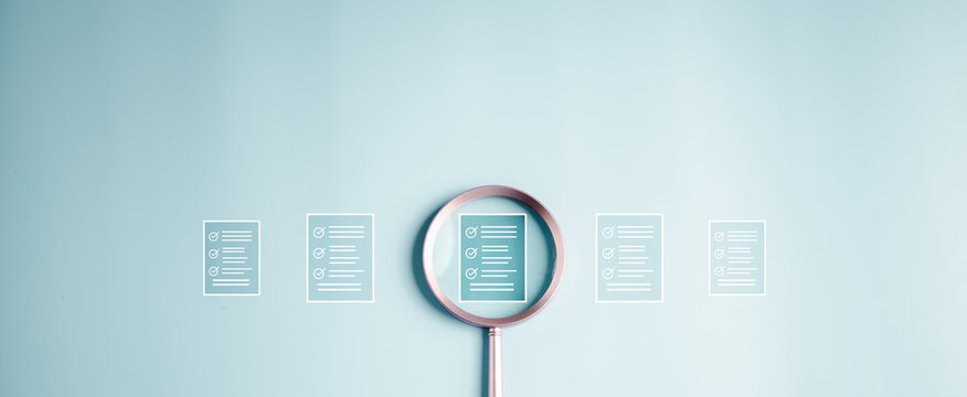 magnifying, search, checklist, data, list, check, file, magnification, find, contract. A magnifying glass is looking at a series of check boxes. Concept of organization and attention to detail.