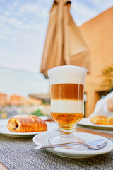 cup of coffee and croissant