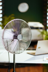 electric fan in modern green office