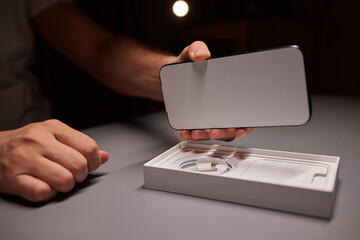 A white sticker protecting the smartphone screen