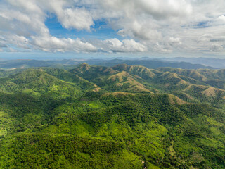 Mountains and green hills. Slopes of mountains with evergreen vegetation. Coron. Palawan, Philippines.