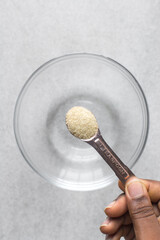 Gelatin powder in a measuring spoon