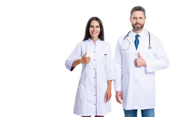 healthcare practitioner doctor isolated on white. medicine and healthcare. doctor offering advertisement, thumb up. health care advertisement. two doctor work in medicine. copy space banner