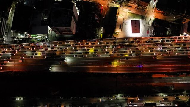 Cars and vehicles running on Skyway at night. Makati, Metro Manila. Philippines.