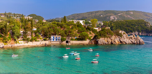 Overlooking the azure waters of Paleokastritsa Bay on Corfu Island, Greece
