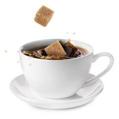 Coffee splashing in cup due to falling sugar cubes on white background