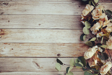 Beautiful pink flowers decoration with space for text message flat lay on wooden background