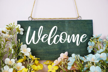 Welcome Sign with flowers frame decorate on pink background - Powered by Adobe