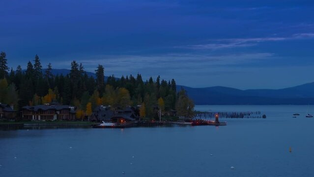 A look at Lake Tahoe in California, USA showcasing houses built along the waters edge, offering a unique perspective of lakeside living. 4K footage.