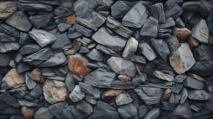 Irregular slate stones are carefully piled to create a sturdy and textured wall pattern.
