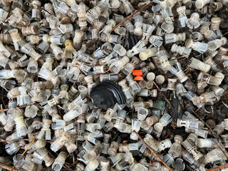 plastic wad waste from shotgun cartridges used during clay pigeon shooting