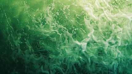 A green ocean with bubbles and foam