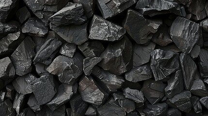 Black coal chunks heaped together a monochrome energy reserve