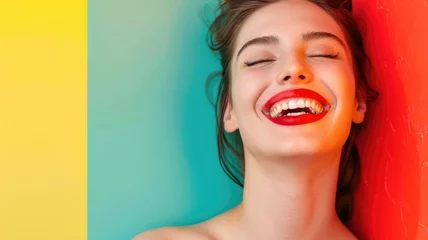 Fotobehang Woman laughing with eyes closed against colorful background © Татьяна Макарова
