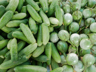 Cucumber and Eggplant on table in market