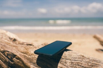 Smart phone on the beach 