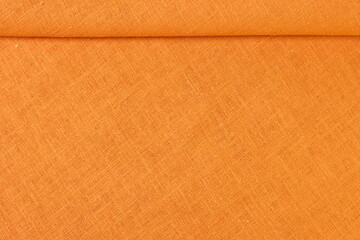 orange hemp viscose natural fabric cloth color, sackcloth rough texture of textile fashion abstract background