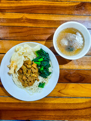 chicken noodle meatball or mie ayam bakso. popular street food in Indonesia