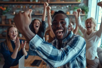 Excited african american man in checkered shirt rejoicing at victory in office