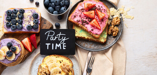 Set with toast bread and different sweet toppings on white background.