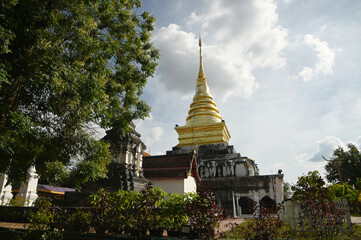 Wat Phra That Chang Kham Worawihan is an old temple, more than 600 years old. There is a Chang Kham Chedi here. It is a Lanka-style pagoda. There are busts of elephants all around. At Nan in Thailand.