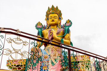 Large colorful Buddhist statue at the Diskit Monastery in the Nubra Valley in northern India