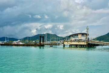 Chalong Pier on an overcast day with storm clouds in the sky — Phuket, Thailand