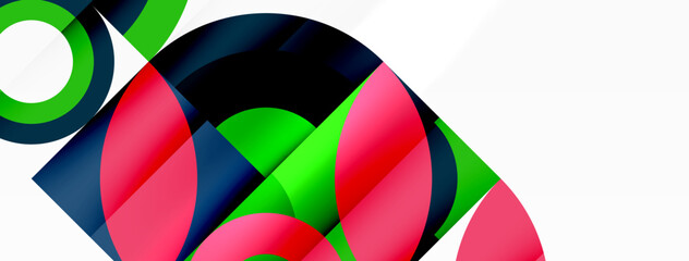 Obraz premium A vibrant design featuring red, green and blue geometric shapes on a white background, showcasing colorfulness, symmetry, and patterns inspired by the automotive wheel system