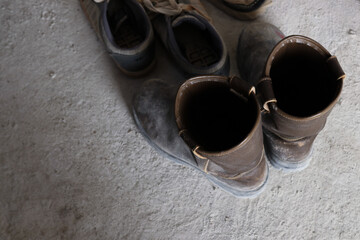 Photo of old brown leather boots taken from the top angel