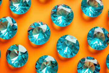 Group of vibrant blue diamonds on a bright orange background with a clear blue sky