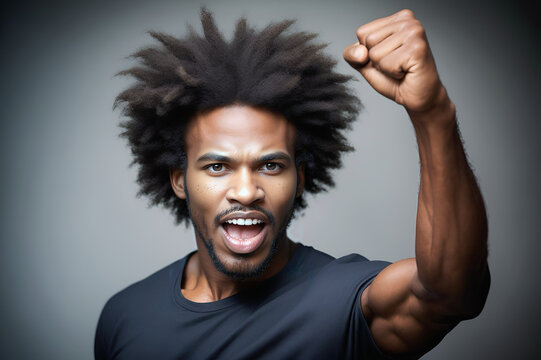 Portrait of a black man with a raised fist