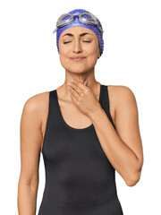 Young Caucasian female professional swimmer suffers pain in throat due a virus or infection.