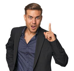 Businessman in suit, studio shot having an idea, inspiration concept.
