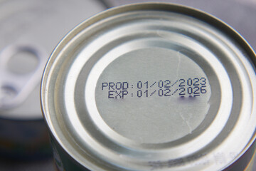 expire date on food can on white background ,
