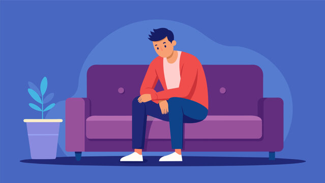 A man sitting on a thes couch finally feeling safe enough to share his deepest traumas and struggles..