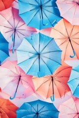 Array of Multicolored Umbrellas Opened Against a Bright Backdrop