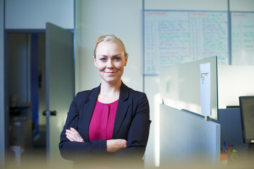 Happy, business and portrait of woman in office with planner, confident consultant or HR manager. Human resources, about us and agent, businesswoman or professional with arms crossed in workplace